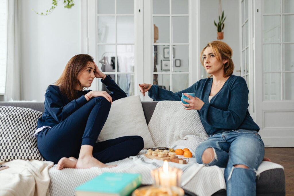 two women in their 40s having a conversation about navigating menopause